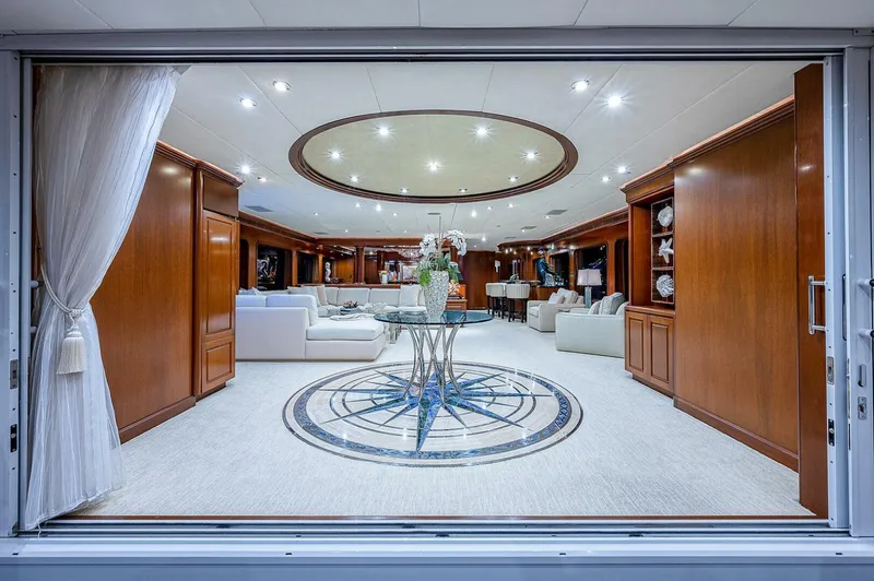 Slide: The Image of Luxurious interior of 2000 Christensen 141 Raised Pilothouse yacht with elegant wood paneling. - 13