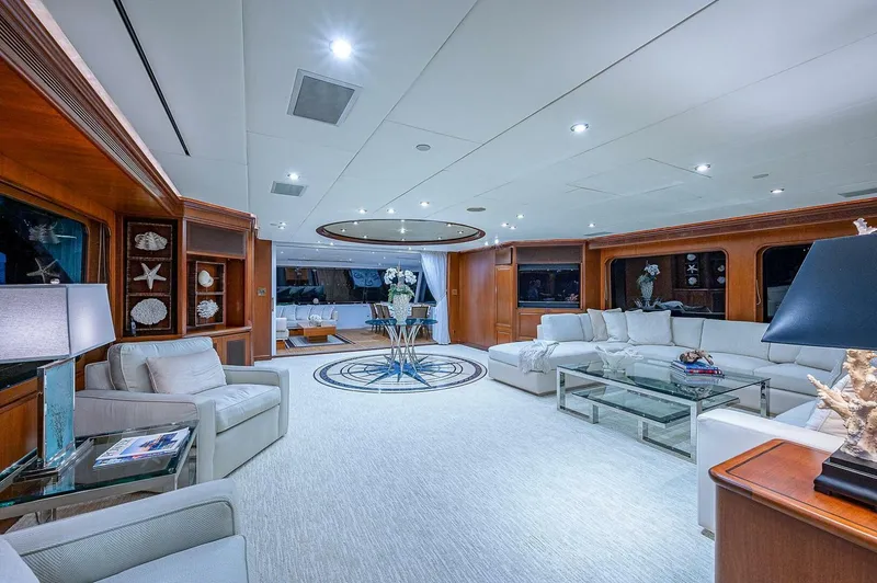 Slide: The Image of Luxurious interior of 2000 Christensen 141 Raised Pilothouse yacht, featuring elegant seating and decor. - 15