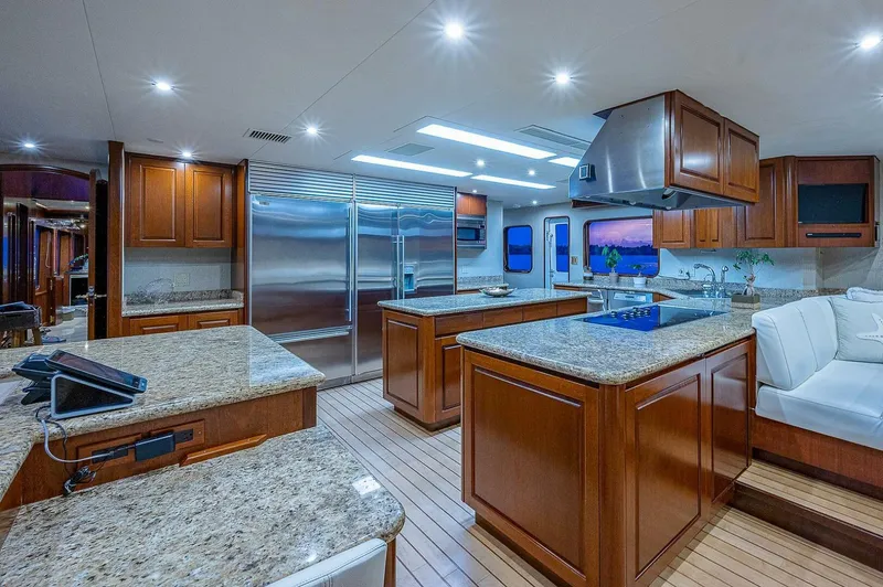 Slide: The Image of Luxurious kitchen interior on 2000 Christensen 141 Raised Pilothouse yacht with granite countertops. - 26