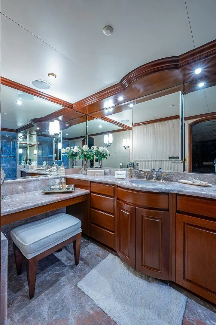 Slide: The Image of Luxurious bathroom in 2000 Christensen 141 Raised Pilothouse yacht with elegant wood cabinetry. - 39