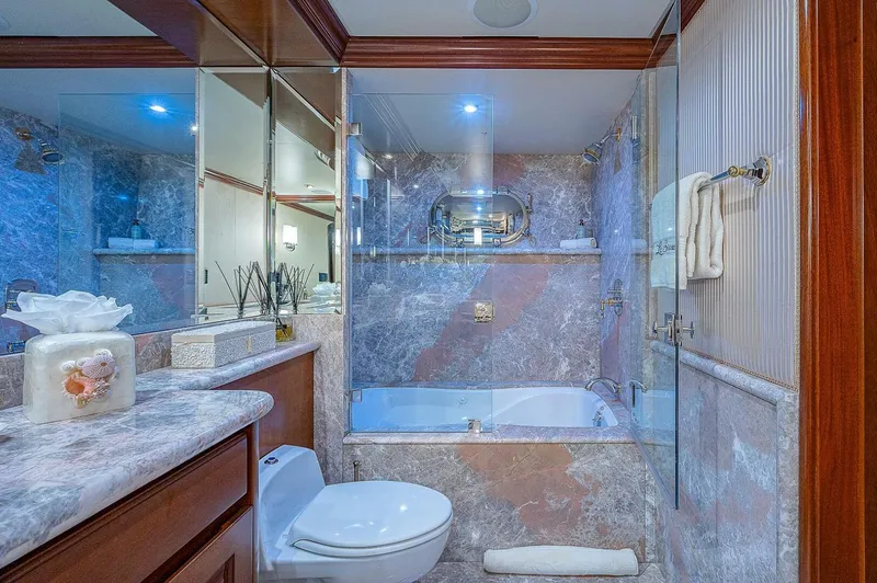 Slide: The Image of Luxurious bathroom with marble decor on Christensen 141 Raised Pilothouse yacht, 2000 model. - 40