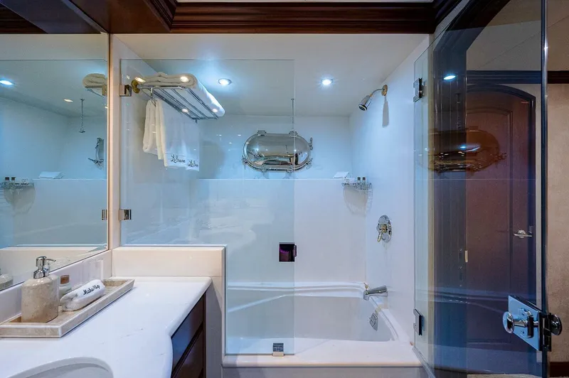 Slide: The Image of Luxurious bathroom on Christensen 141 Raised Pilothouse yacht, featuring modern fixtures and elegant design. - 48