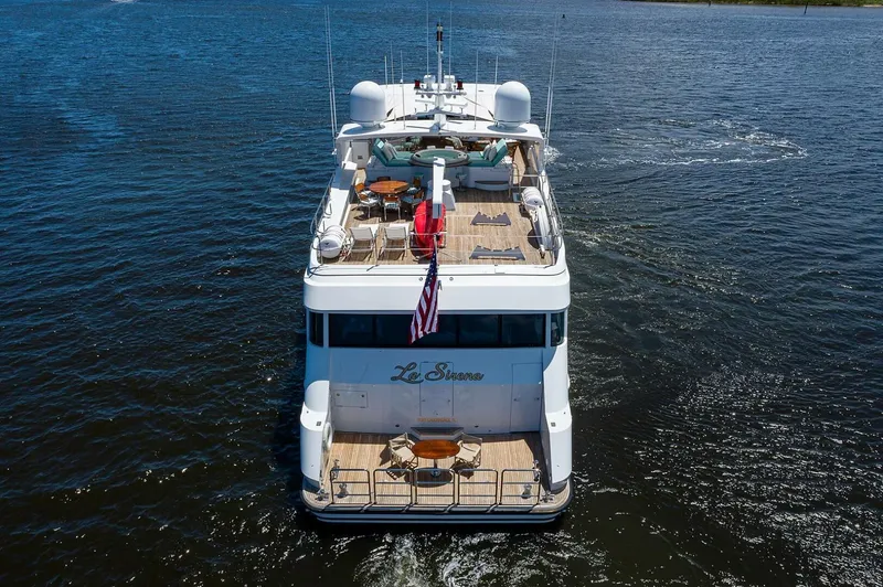 Slide: The Image of Christensen 141 Raised Pilothouse yacht, 2000 model, cruising on open water. - 7