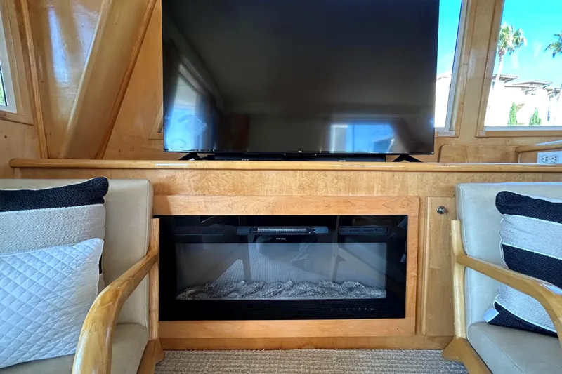 Slide: The Image of Interior of 1999 Navigator 53 Classic yacht with TV and fireplace. - 13
