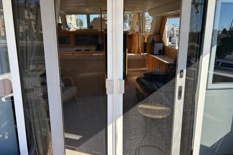 Slide: The Image of Salon entry door from cockpit with screens - 45