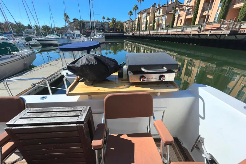 Slide: The Image of Transom BBQ and seating in cockpit - 50