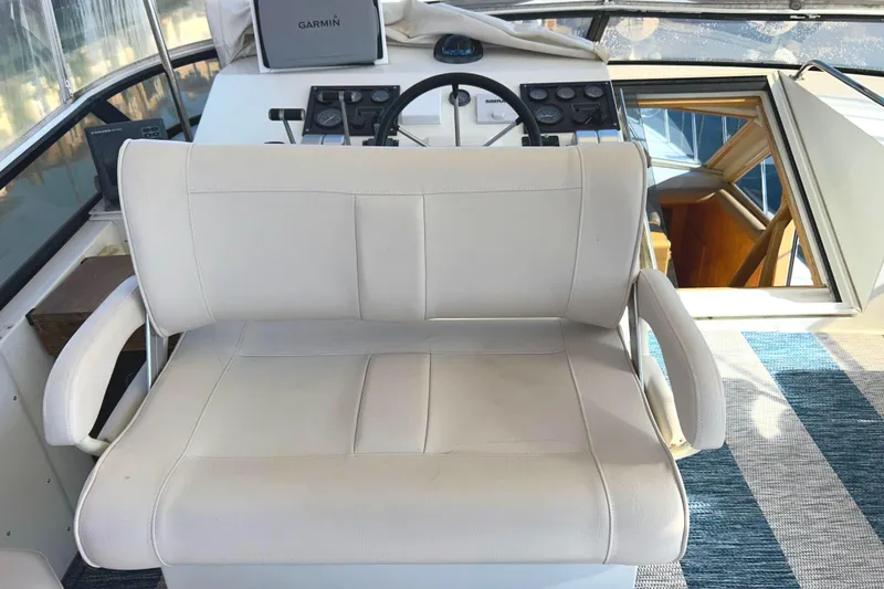 Slide: The Image of Captains bench seat with seat back reversed to face guest seating - 62