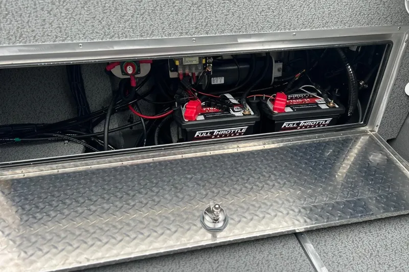 Slide: The Image of 2026 Thunder Jet 22 Chinook OS battery compartment with Full Throttle batteries and wiring. - 25