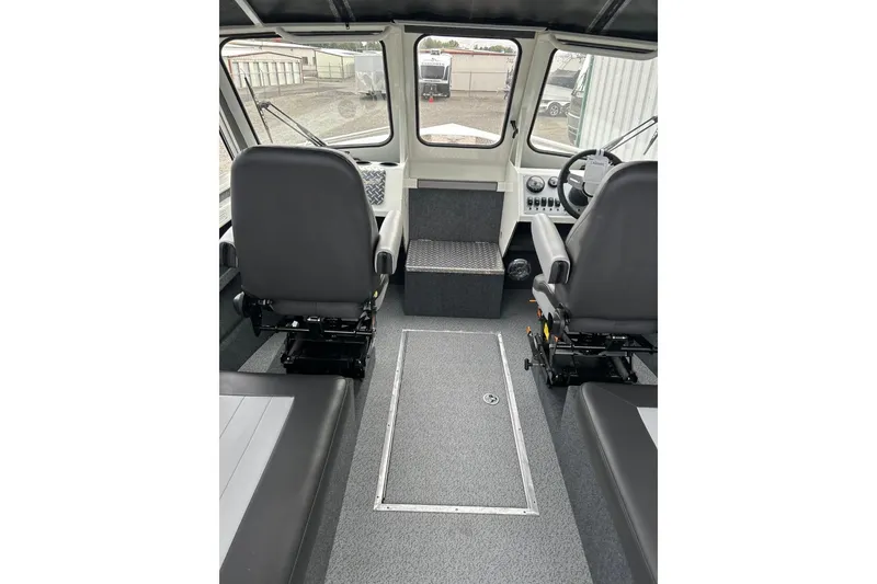 Slide: The Image of Interior of 2026 Thunder Jet 22 Chinook OS boat with modern seating and controls. - 30