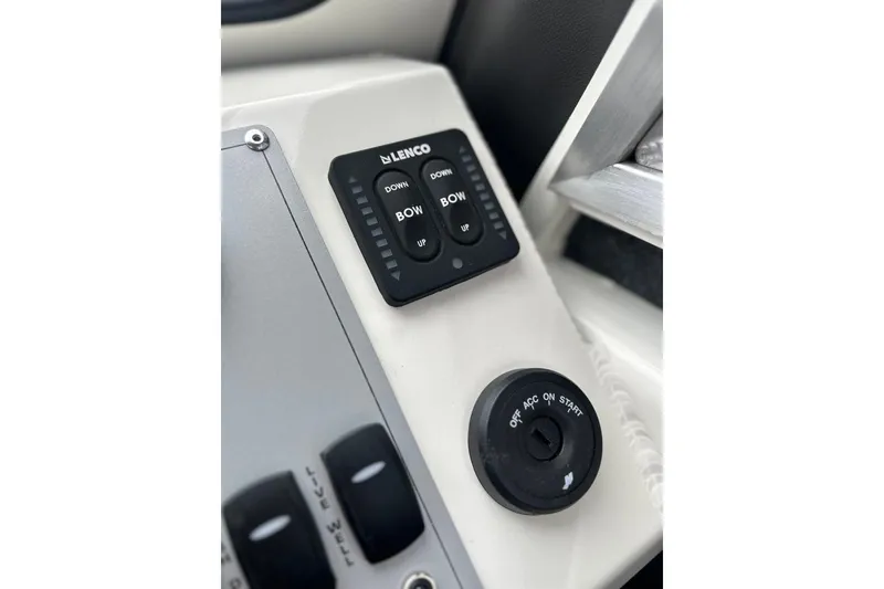 Slide: The Image of Control panel of 2026 Thunder Jet 22 Chinook OS boat with Lenco trim tab switches. - 34