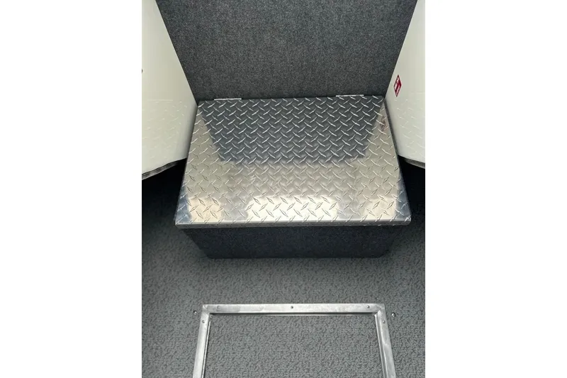 Slide: The Image of 2026 Thunder Jet 22 Chinook OS interior with diamond plate seat cover. - 36