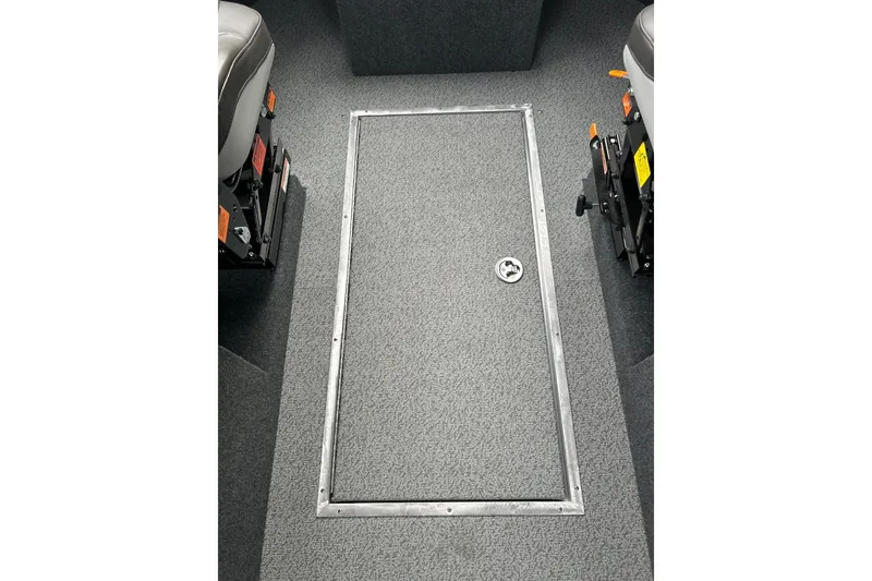 Slide: The Image of 2026 Thunder Jet 22 Chinook OS interior floor with storage compartment. - 37