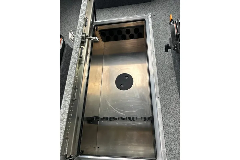 Slide: The Image of Open storage compartment in 2026 Thunder Jet 22 Chinook OS boat. - 38