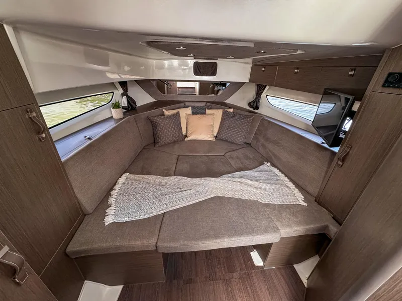 Slide: The Image of 2024 Beneteau Flyer 10 cabin interior with cozy seating and modern design. - 14