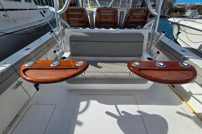 Slide: The Image of 2020 Valhalla Boatworks V-41 docked at sunset, reflecting on calm water. - 13