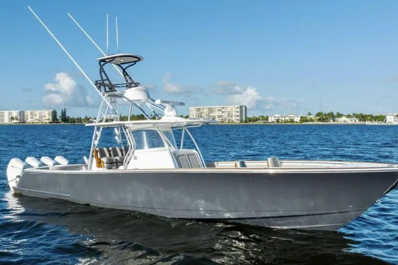 Slide: The Image of 2020 Valhalla Boatworks V-41 on water, sleek design, clear sky background. - 1