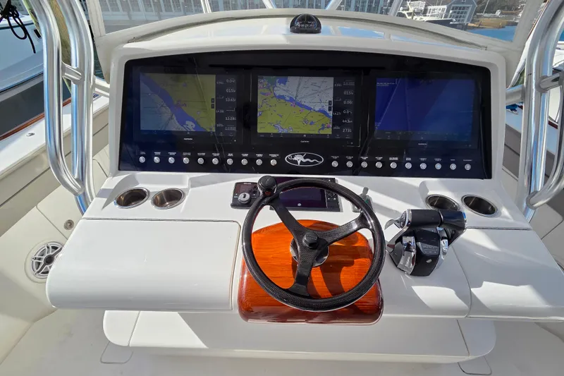 Slide: The Image of 2020 Valhalla Boatworks V-41 helm with advanced navigation displays and controls. - 6