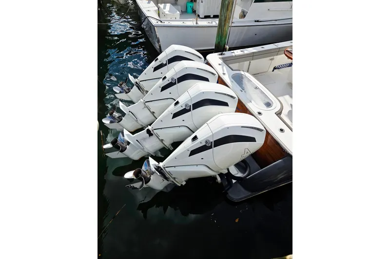 Slide: The Image of Four powerful outboard engines on a 2020 Valhalla Boatworks V-41 at the dock. - 9