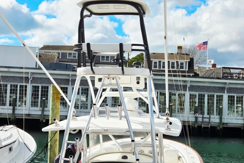 Slide: The Image of 2020 Valhalla Boatworks V-41 docked at marina with American flag in background. - 4