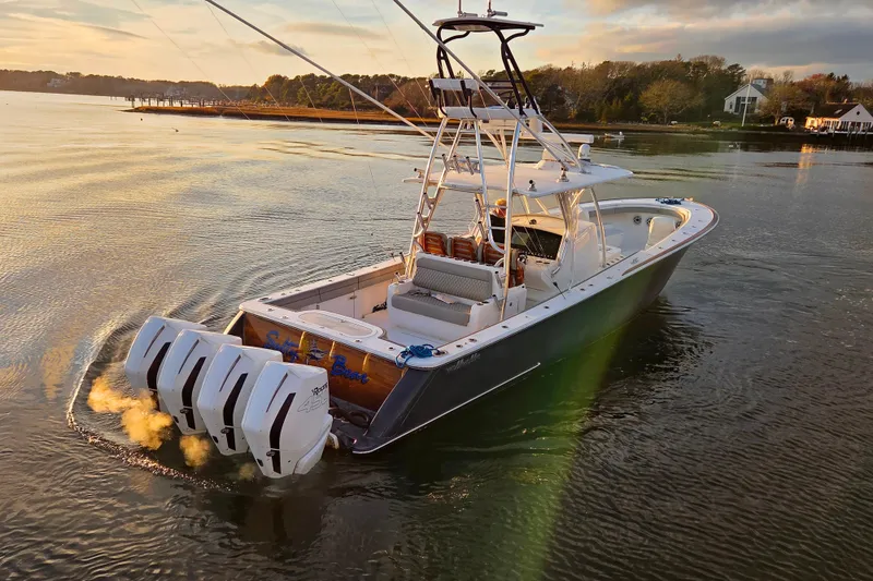 Slide: The Image of 2020 Valhalla Boatworks V-41 cruising on calm waters at sunset. - 12