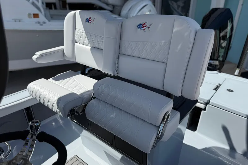 Slide: The Image of Luxury seating on 2026 Crevalle 26 HCO boat, featuring premium upholstery and design. - 33