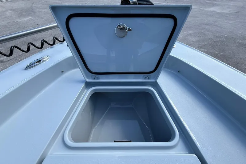Slide: The Image of Open storage compartment on 2026 Crevalle 26 HCO boat deck. - 50