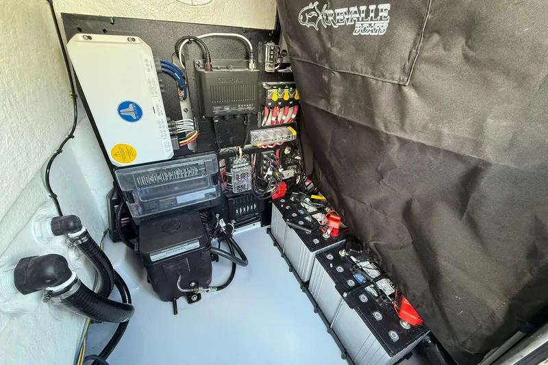 Slide: The Image of Electrical system of 2026 Crevalle 26 HCO boat with batteries and wiring. - 62