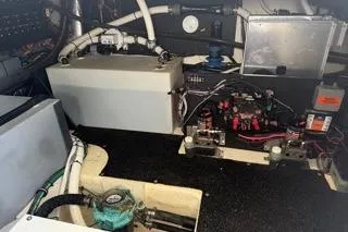 Slide: The Image of Electrical panel of a 2021 Regal 38 XO boat with organized wiring and components. - 43