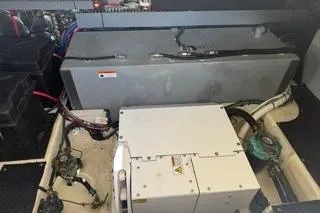 Slide: The Image of 2021 Regal 38 XO engine compartment with wiring and components visible. - 45