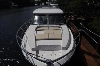 Slide: The Image of Engine compartment of 2021 Regal 38 XO boat with visible hoses and filters. - 50