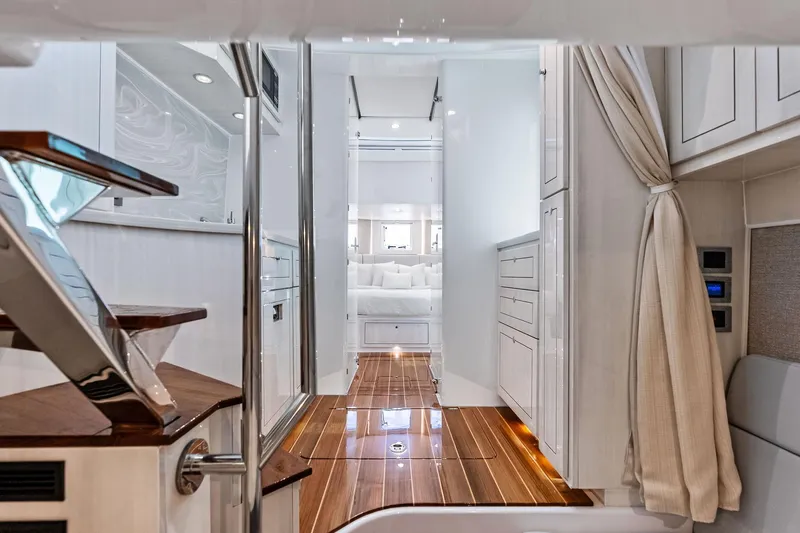Slide: The Image of Luxurious interior of 2025 HCB 56 Suenos GIX yacht with elegant wood flooring. - 21