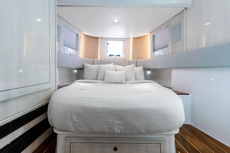 Slide: The Image of Luxurious cabin interior of 2025 HCB 56 Suenos GIX yacht with elegant bedding. - 22