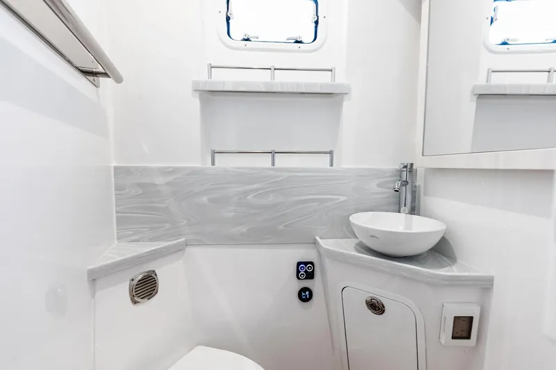 Slide: The Image of Luxurious bathroom interior of 2025 HCB 56 Suenos GIX yacht with modern fixtures. - 30