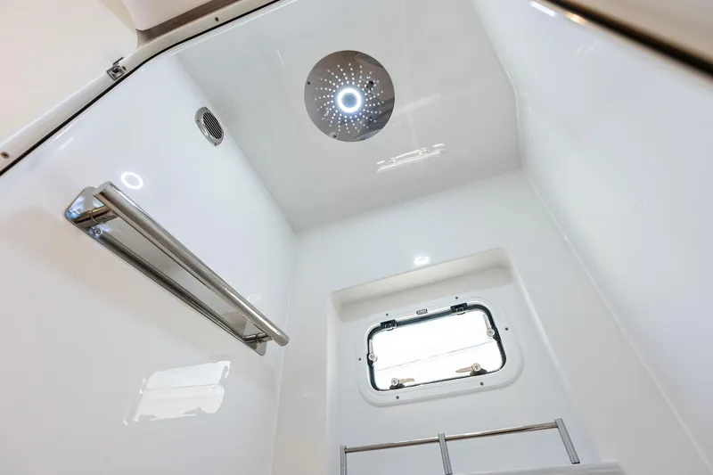 Slide: The Image of 2025 HCB 56 Suenos GIX interior shower with modern fixtures and window. - 31