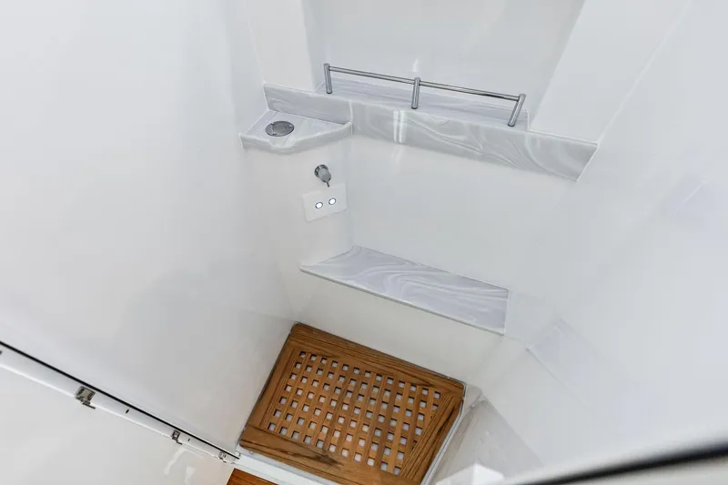 Slide: The Image of 2025 HCB 56 Suenos GIX shower with wooden floor and modern fixtures. - 32