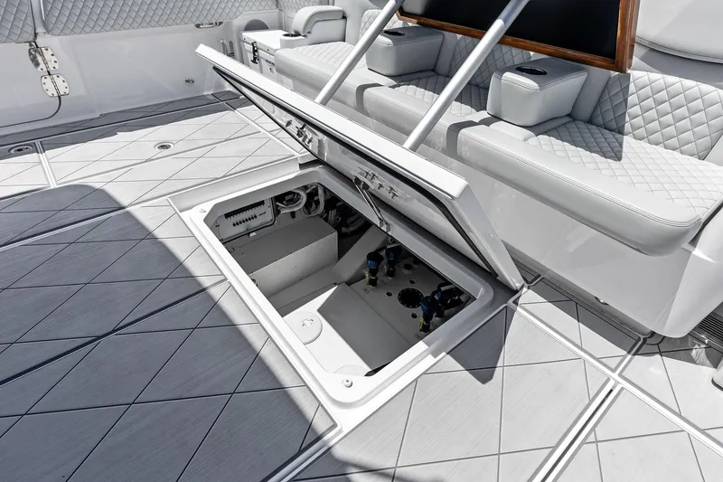 Slide: The Image of Open storage compartment on 2025 HCB 56 Suenos GIX yacht deck, showcasing luxury design. - 33