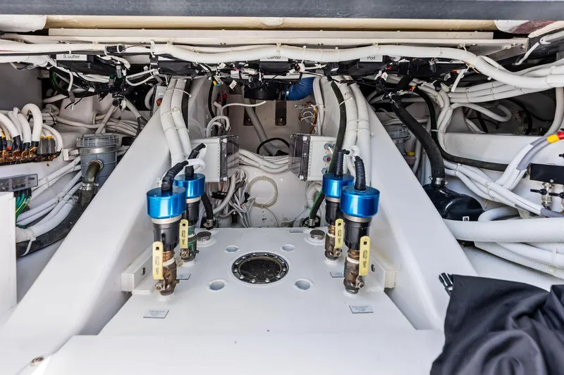 Slide: The Image of Engine room of 2025 HCB 56 Suenos GIX with complex wiring and components. - 34