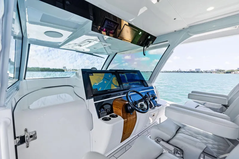 Slide: The Image of 2025 HCB 56 Suenos GIX helm with advanced navigation screens and luxurious seating. - 37