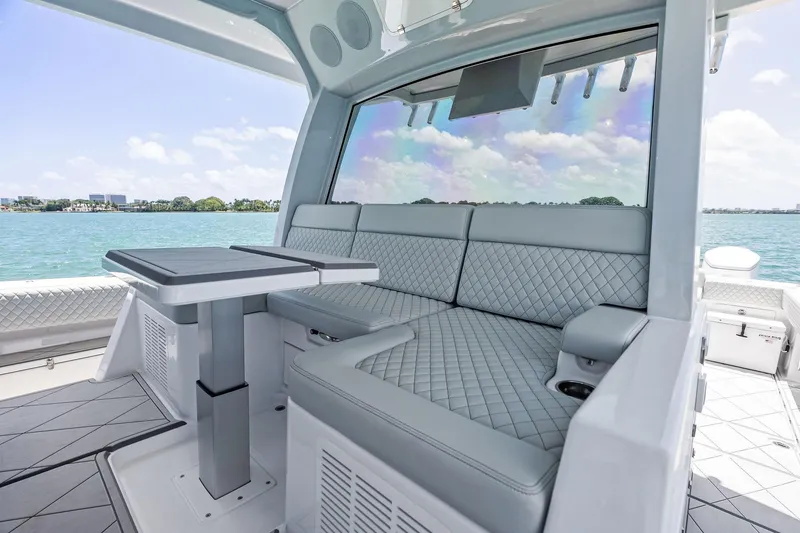 Slide: The Image of Luxurious seating area on the 2025 HCB 56 Suenos GIX yacht with ocean view. - 40