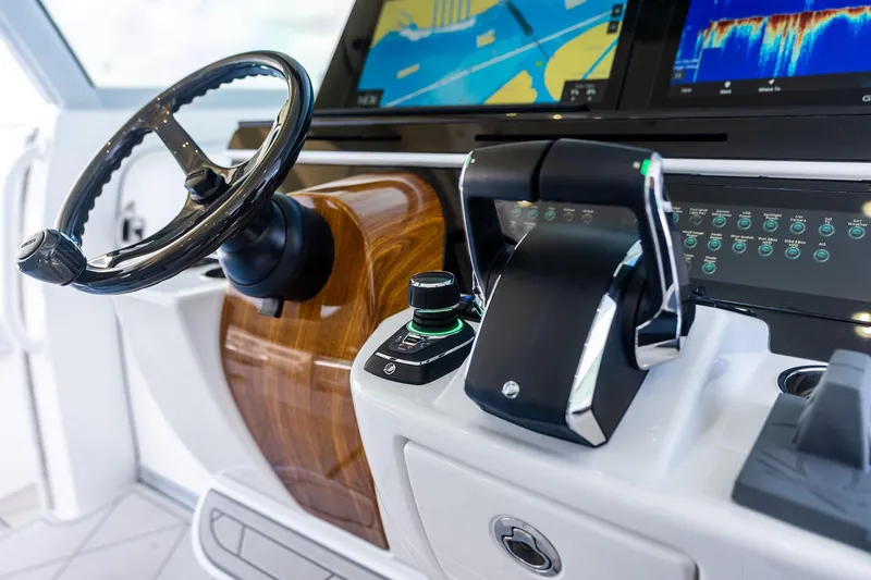 Slide: The Image of Helm of 2025 HCB 56 Suenos GIX with advanced navigation controls and displays. - 41