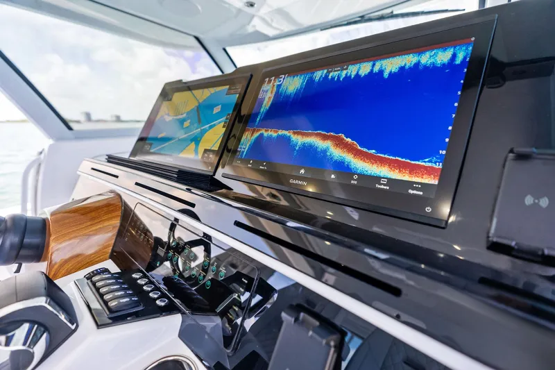 Slide: The Image of Helm of 2025 HCB 56 Suenos GIX with advanced Garmin navigation displays. - 42
