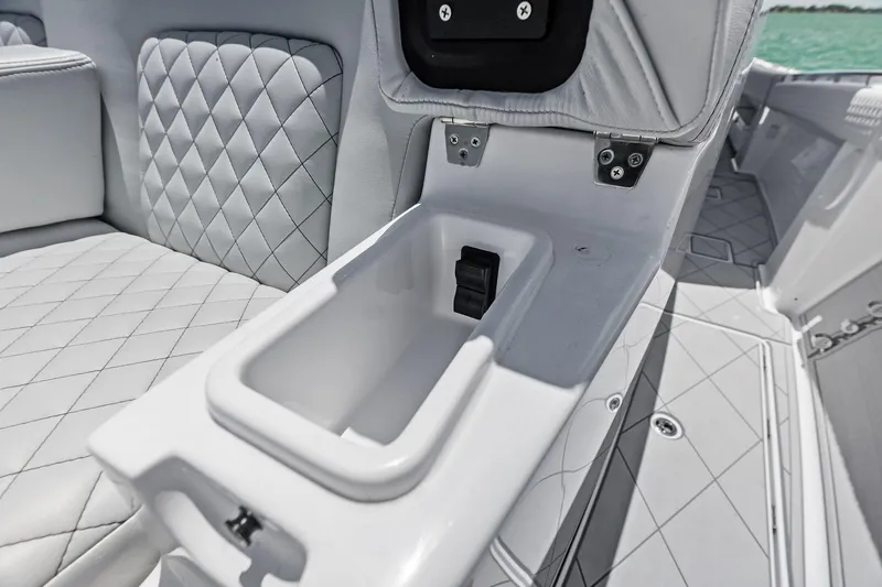 Slide: The Image of Luxury seating and storage on 2025 HCB 56 Suenos GIX boat. - 48