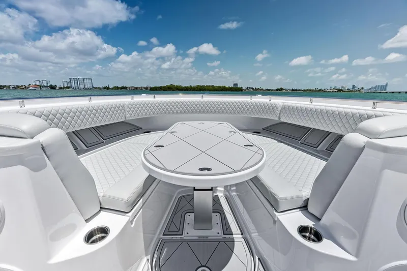 Slide: The Image of Luxurious seating area on 2025 HCB 56 Suenos GIX yacht, featuring elegant white upholstery. - 51
