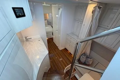 Slide: The Image of Luxurious interior of 2025 HCB 56 Suenos GIX yacht with modern design and wood flooring. - 66