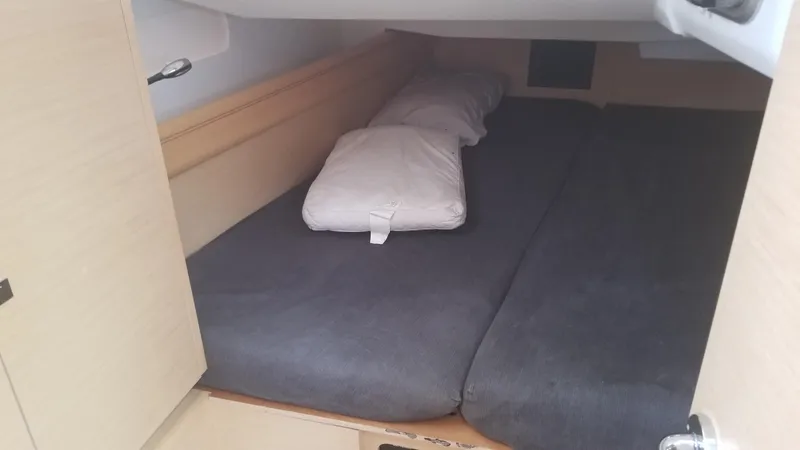 Slide: The Image of Cozy cabin bed in 2016 Jeanneau Sun Odyssey 419 sailboat interior. - 10