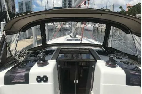 Slide: The Image of 2016 Jeanneau Sun Odyssey 419 sailboat cockpit with marina view. - 3