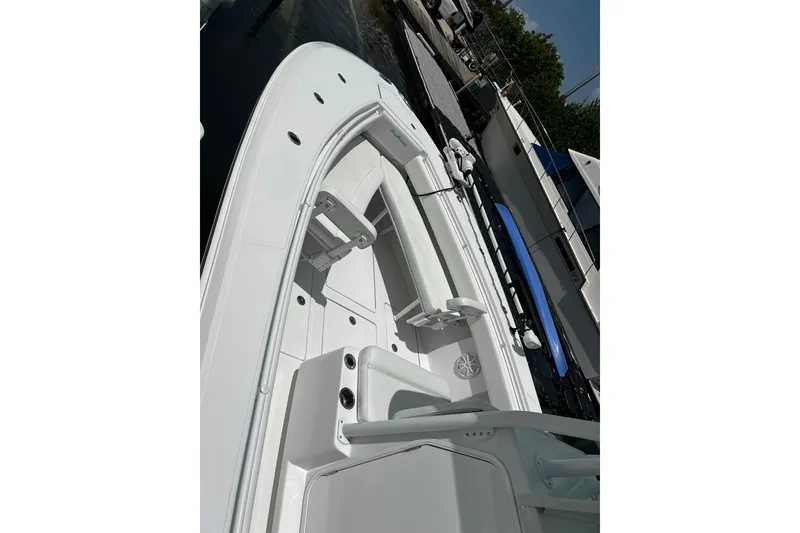 Slide: The Image of 2018 SeaHunter 31 Tournament boat interior with seating and storage compartments. - 8