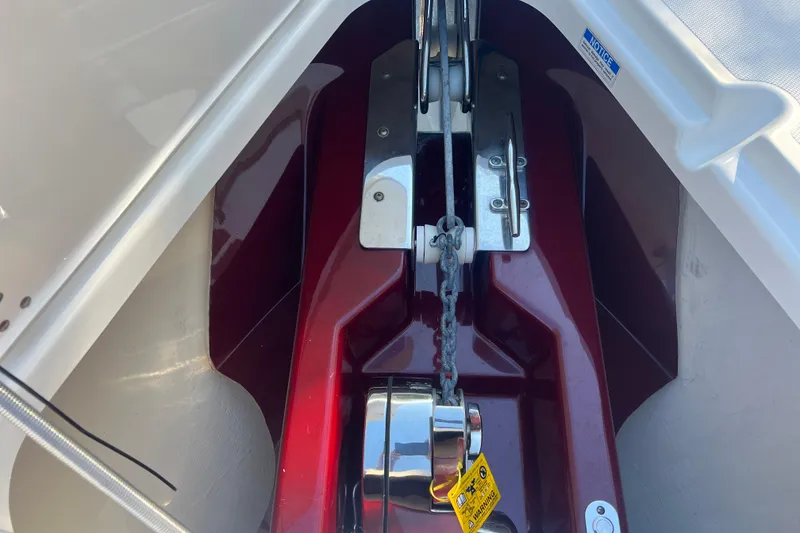 Slide: The Image of Anchor chain mechanism on 2010 Pursuit C 280 Center Console boat. - 25