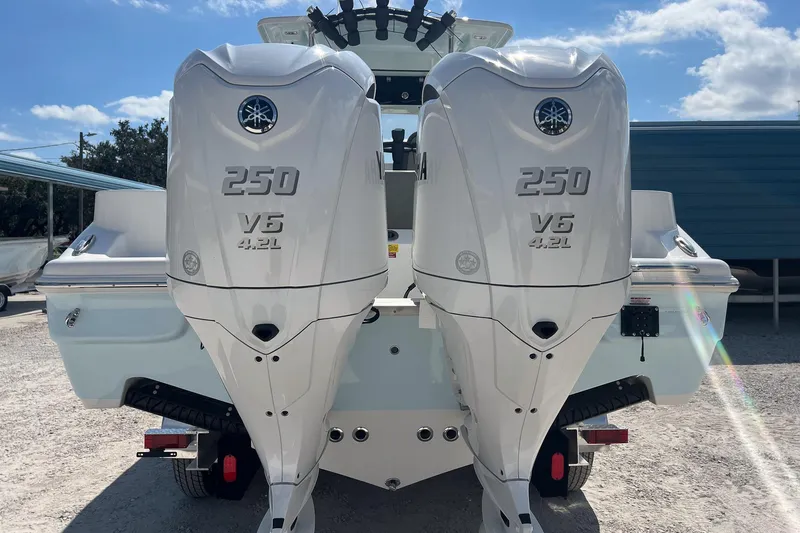 Slide: The Image of 2026 Key West 263 FS boat with dual Yamaha 250 V6 4.2L engines. - 5