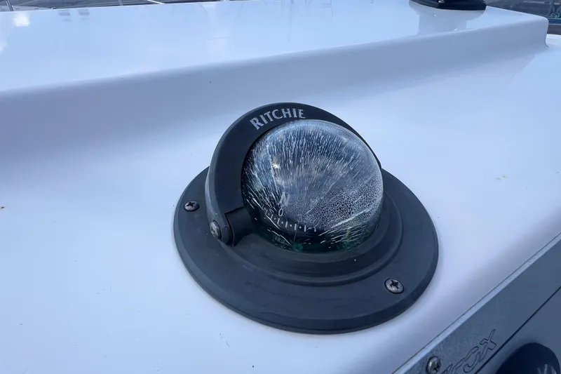 Slide: The Image of Cracked Ritchie compass on 2005 Sea Fox 197 Center Console boat. - 25